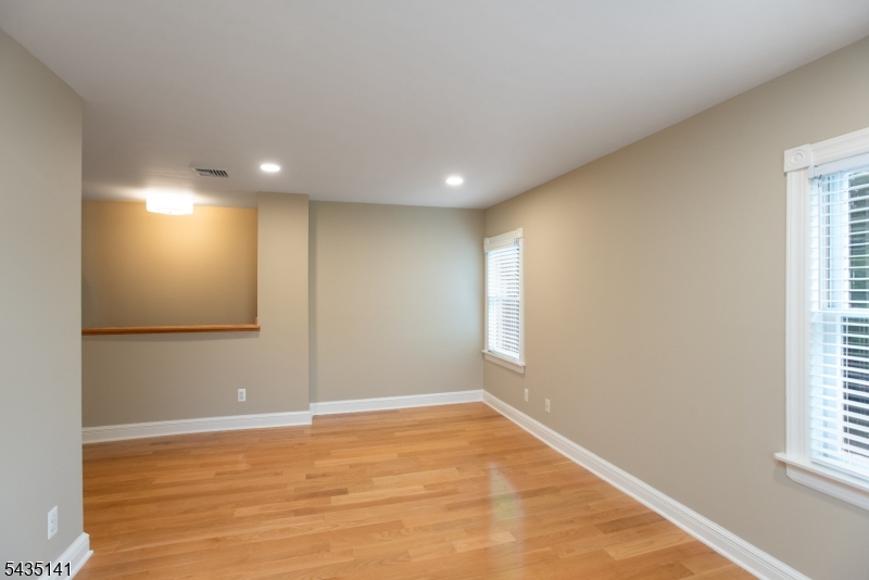 14 Locust Street Madison, NJ 07940 - Photo 29 of 33 a view of empty room with wooden floor