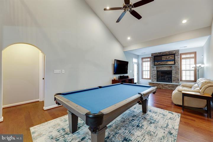 24876 Helms Terrace Aldie, VA 20105 - Photo 17 of 45 a living room with furniture pool table and flat screen tv