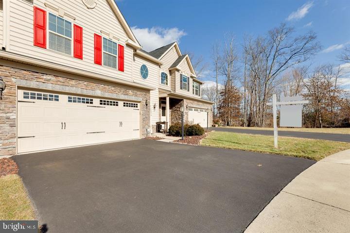 24876 Helms Terrace Aldie, VA 20105 - Photo 2 of 45 a view of a building with a street