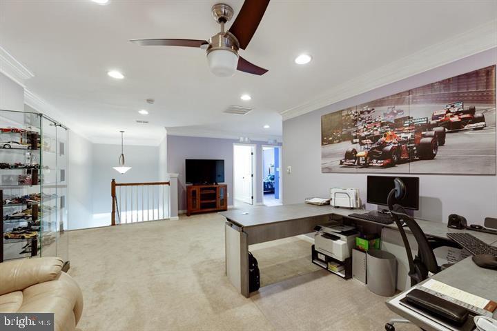 24876 Helms Terrace Aldie, VA 20105 - Photo 33 of 45 a room with furniture and a flat screen tv