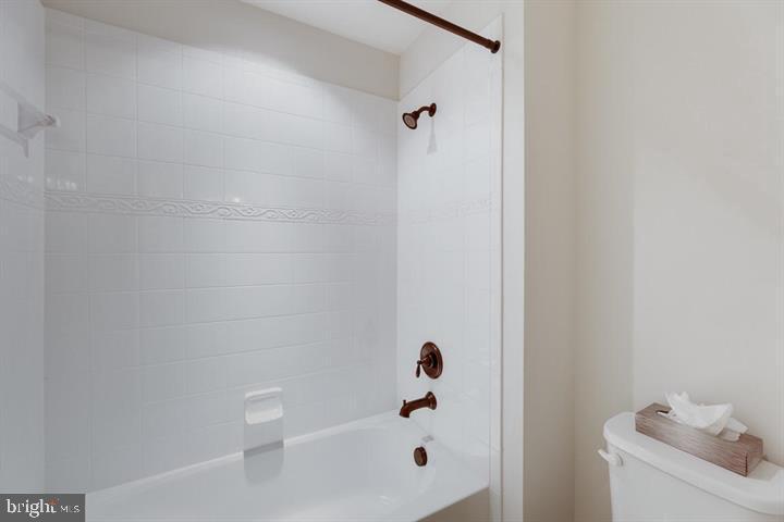 24876 Helms Terrace Aldie, VA 20105 - Photo 37 of 45 a bathroom with a bathtub