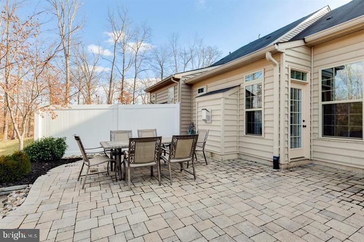 24876 Helms Terrace Aldie, VA 20105 - Photo 42 of 45 a view of a patio with table and chairs