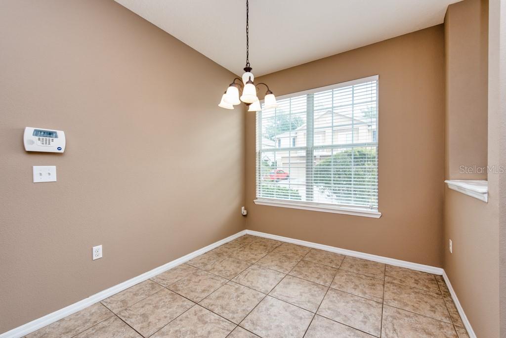 7525 Red Mill Circle New Port Richey, FL 34653 - Photo 13 of 41 a view of an empty room with a window