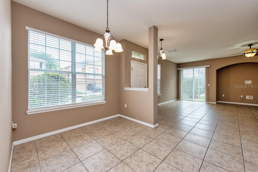 7525 Red Mill Circle New Port Richey, FL 34653 - Photo 14 of 41 a view of an empty room with a window
