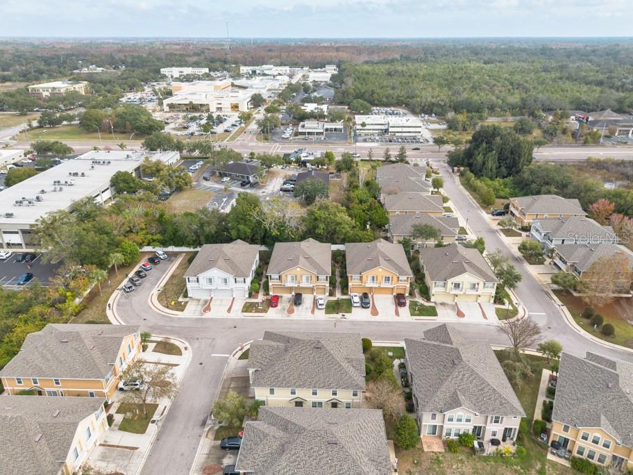 7525 Red Mill Circle New Port Richey, FL 34653 - Photo 39 of 41 an aerial view of residential houses with outdoor space