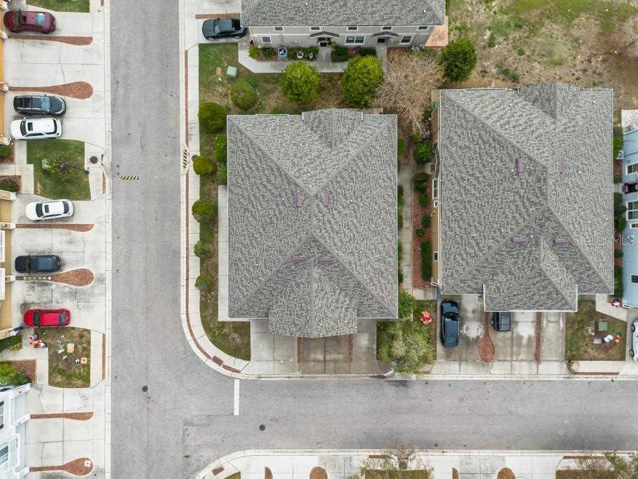 7525 Red Mill Circle New Port Richey, FL 34653 - Photo 41 of 41 an aerial view of a house with swimming pool
