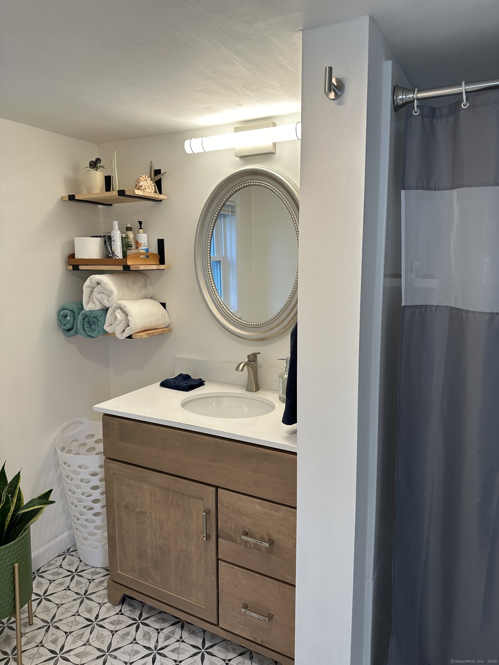 59 High Street Groton, CT 06340 - Photo 6 of 15 a room with a cabinets and washer