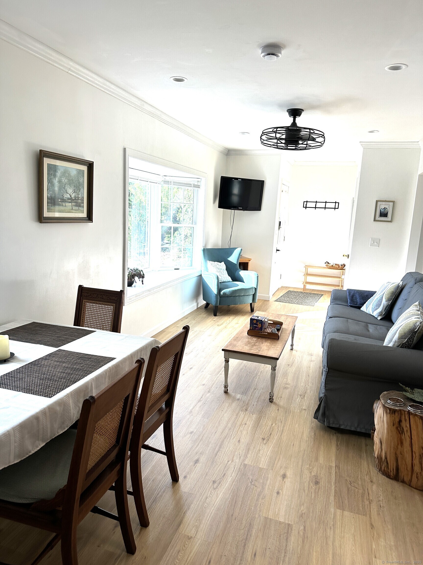 59 High Street Groton, CT 06340 - Photo 8 of 15 a living room with furniture and a flat screen tv