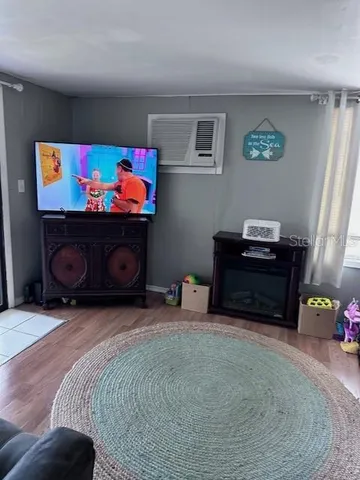 a room with furniture and a fireplace