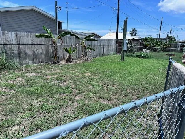 a view of a backyard with a garden