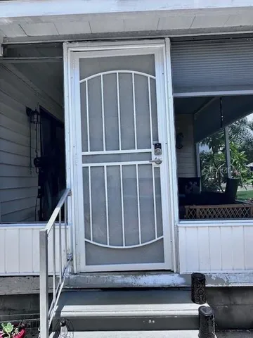 a view of entryway with a front door