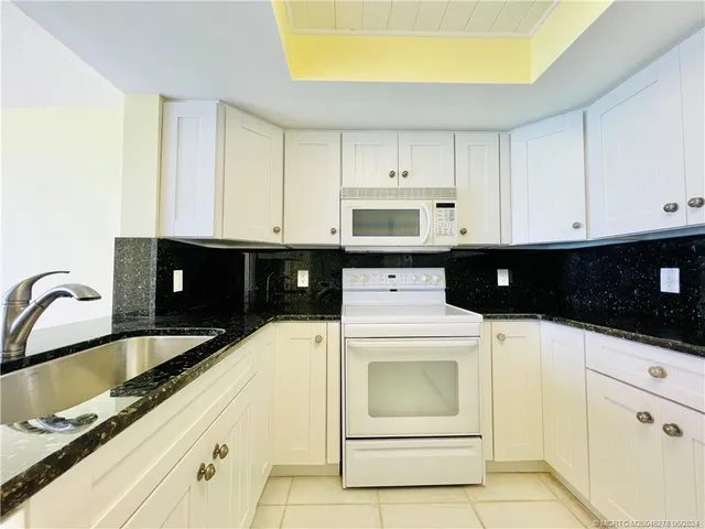 a view of an empty room with a balcony