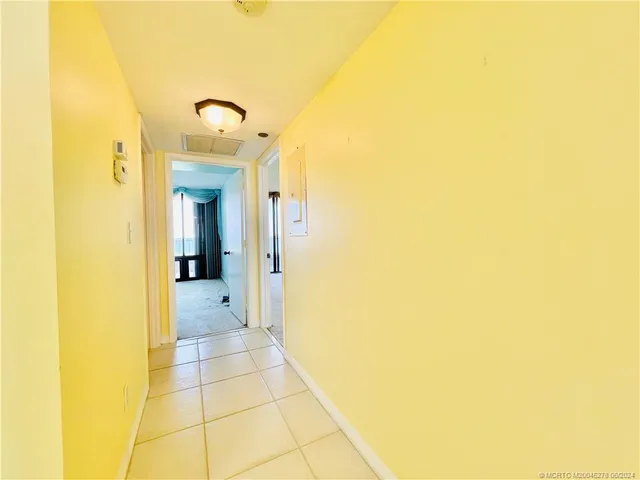 a view of balcony with furniture