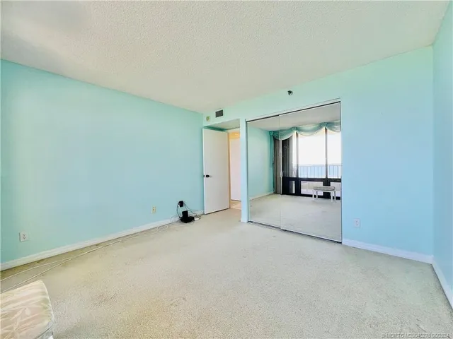 a view of balcony with furniture