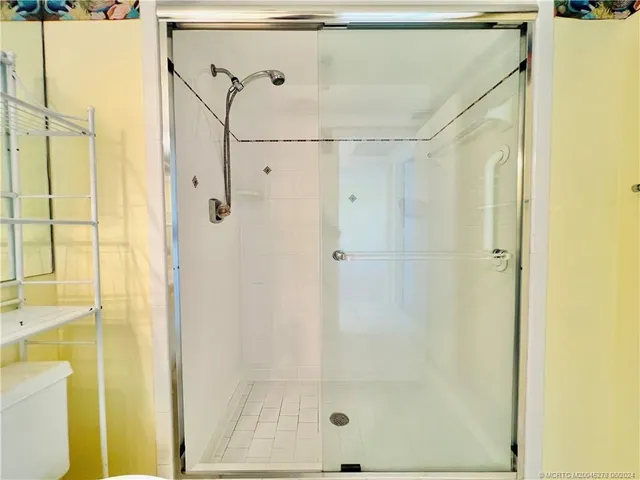 an empty room with a empty space and a window