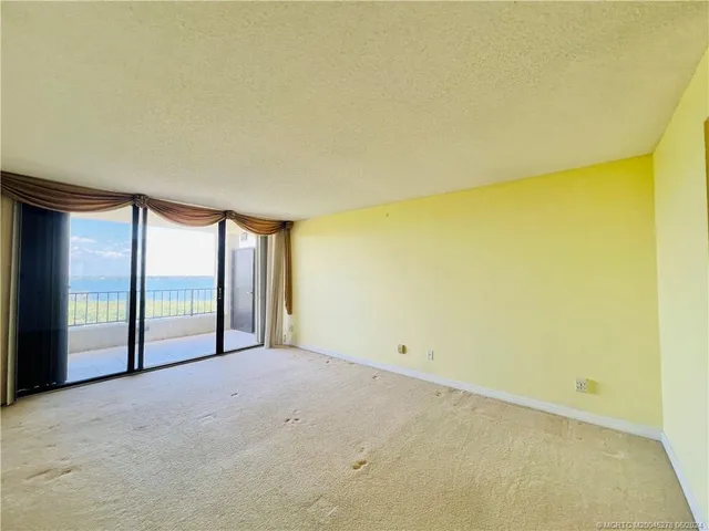 a bathroom with a double vanity sink mirror and shower