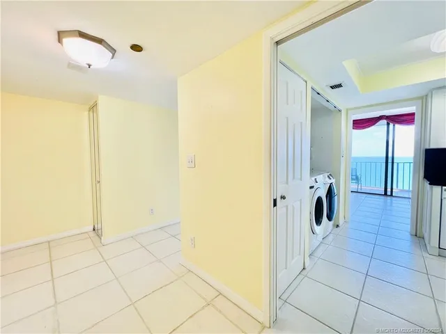 a kitchen with stainless steel appliances a stove a microwave and a refrigerator