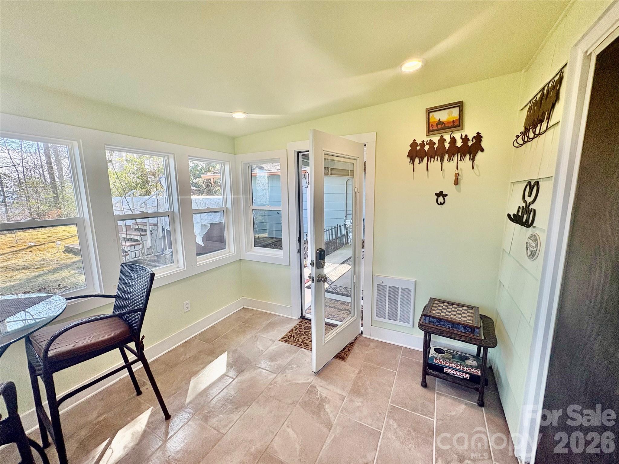 126 Ridgeview Road Spruce Pine, NC 28777 - Photo 18 of 39 a living room with furniture and a large window
