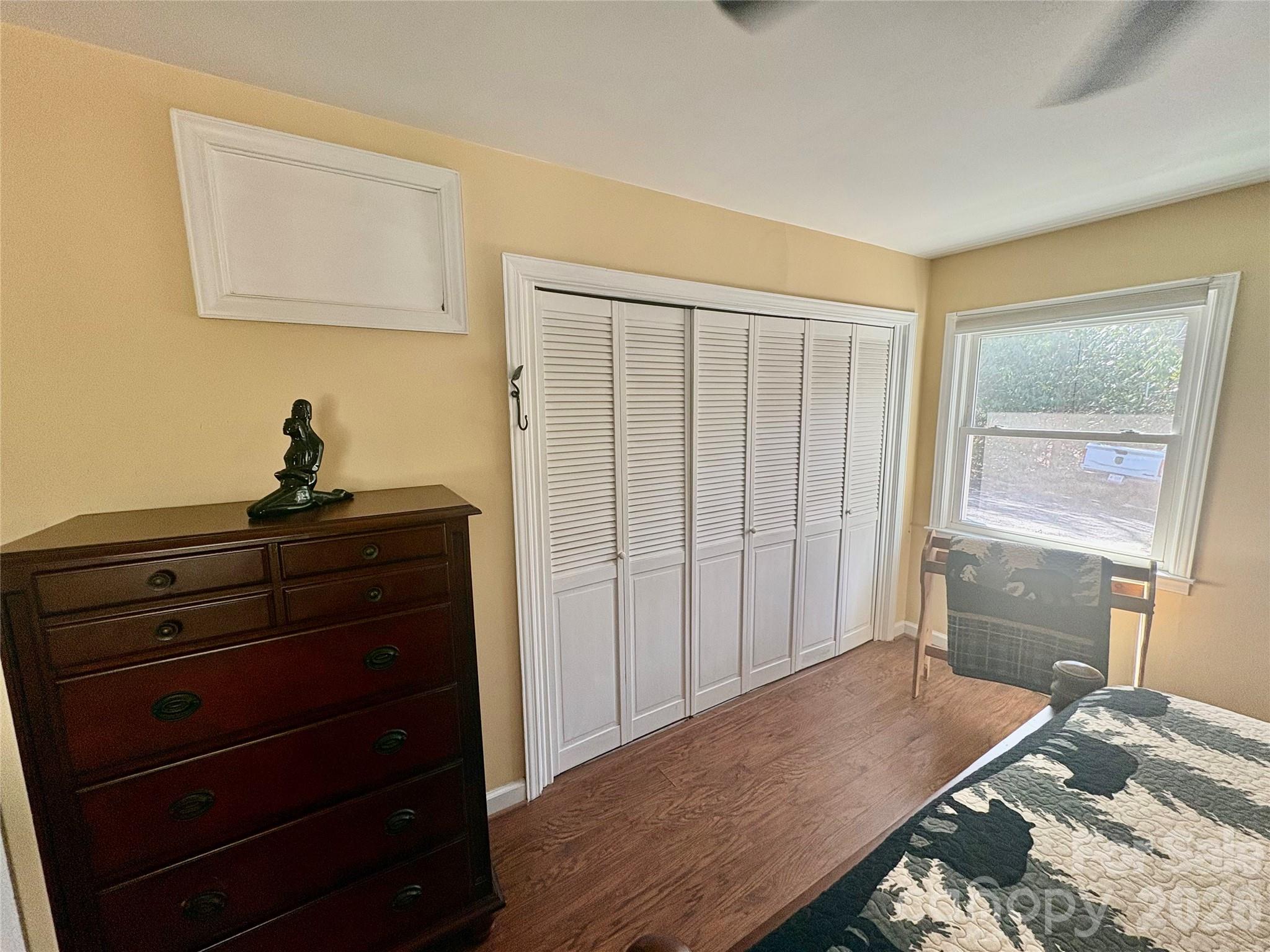 126 Ridgeview Road Spruce Pine, NC 28777 - Photo 24 of 39 a bedroom with a bed and a window