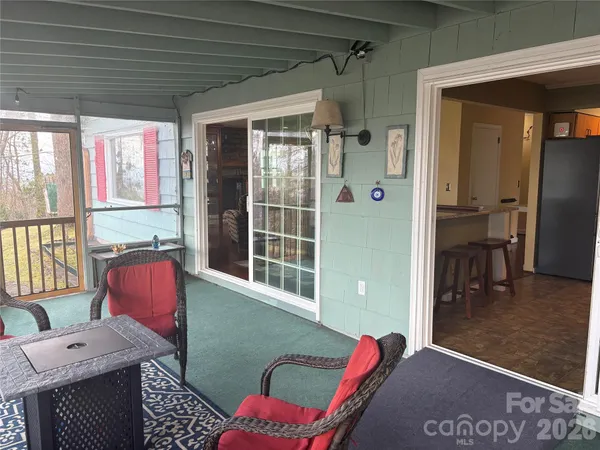 a living room with furniture and window