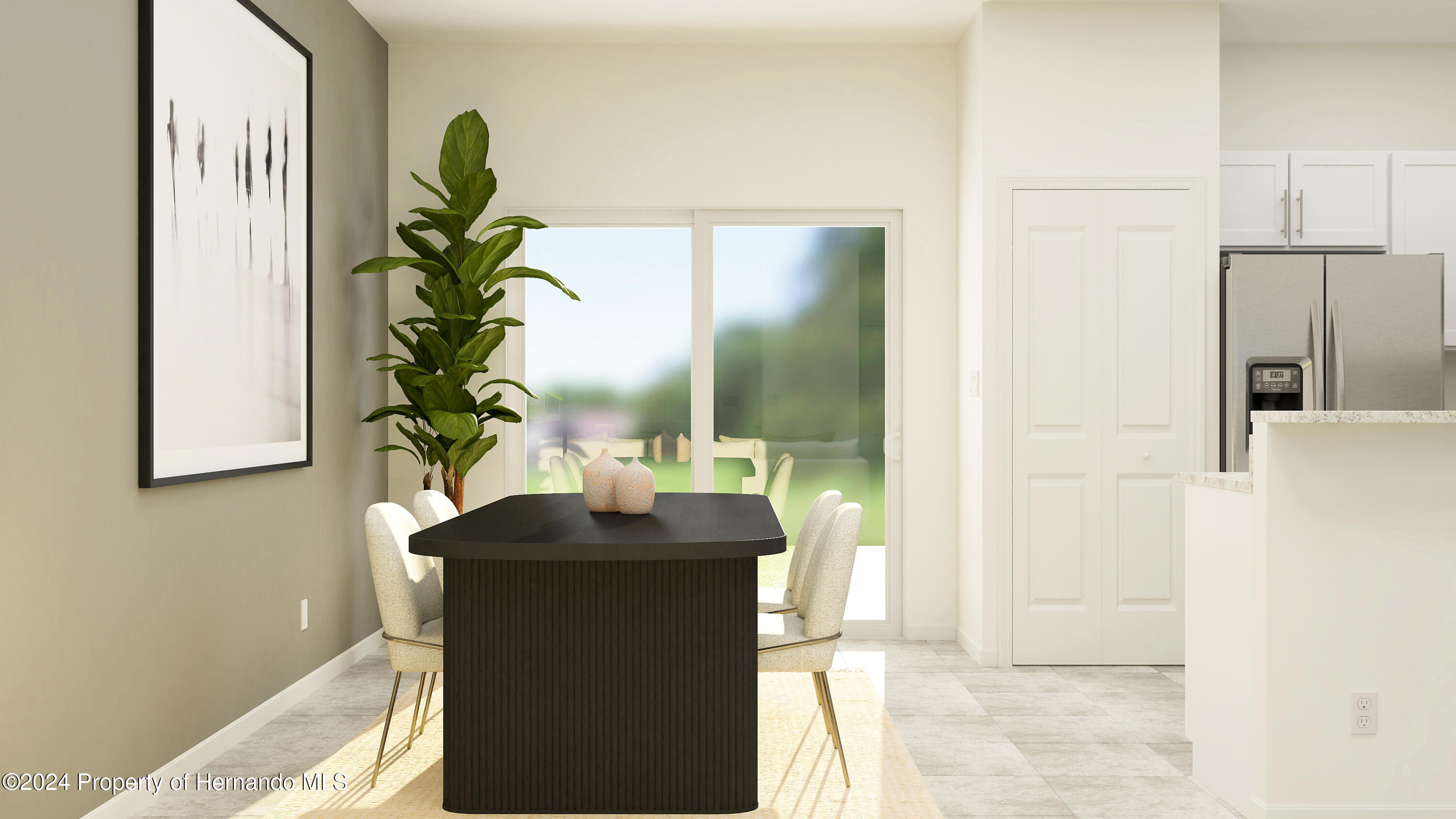 11053 Wishing Cloud Road Land O Lakes, FL 34638 - Photo 6 of 9 a dining room with table and chairs
