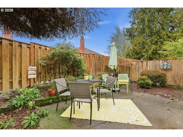 a view of a chairs and tables in the patio
