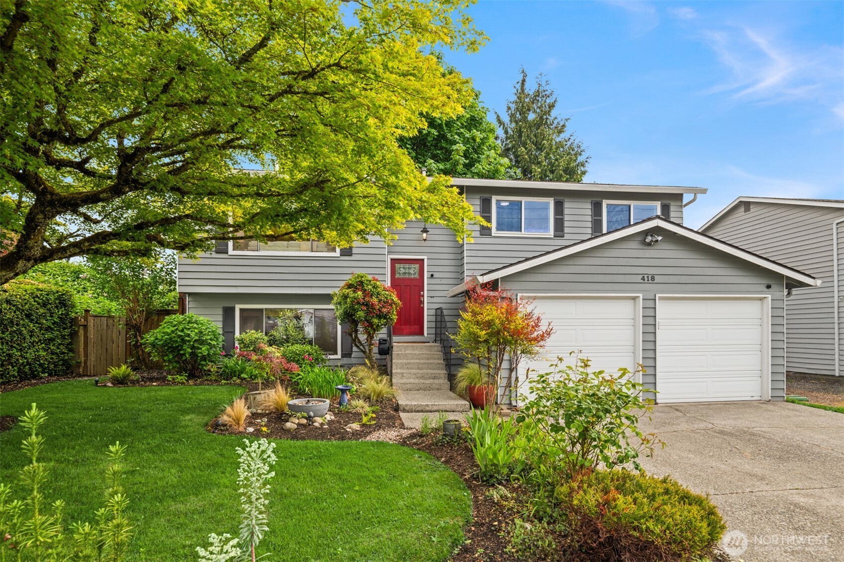 418 212th Street Southwest Bothell, WA 98021 - Photo 3 of 40 front view of a house with a yard