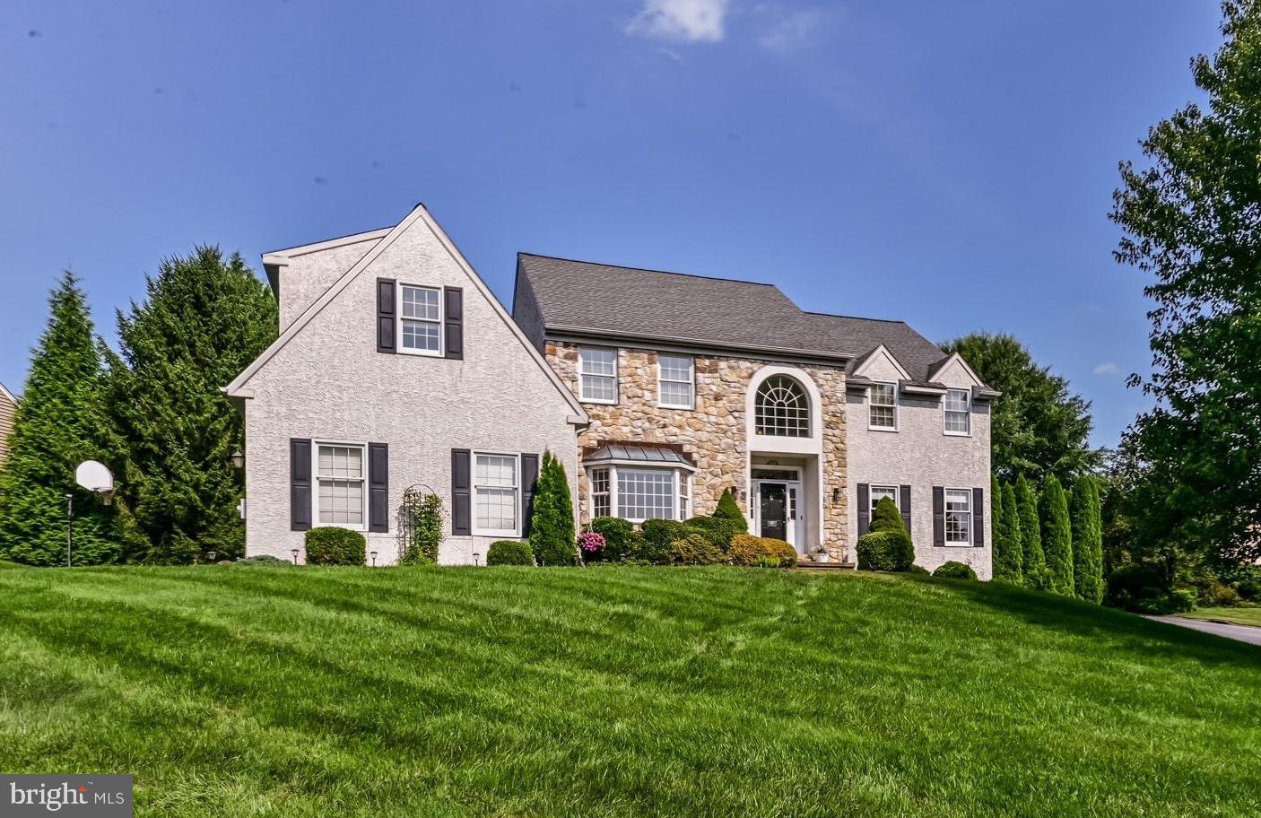 706 Regency Hill Road Hockessin, DE 19707 - Photo 1 of 54 a front view of a house with a yard