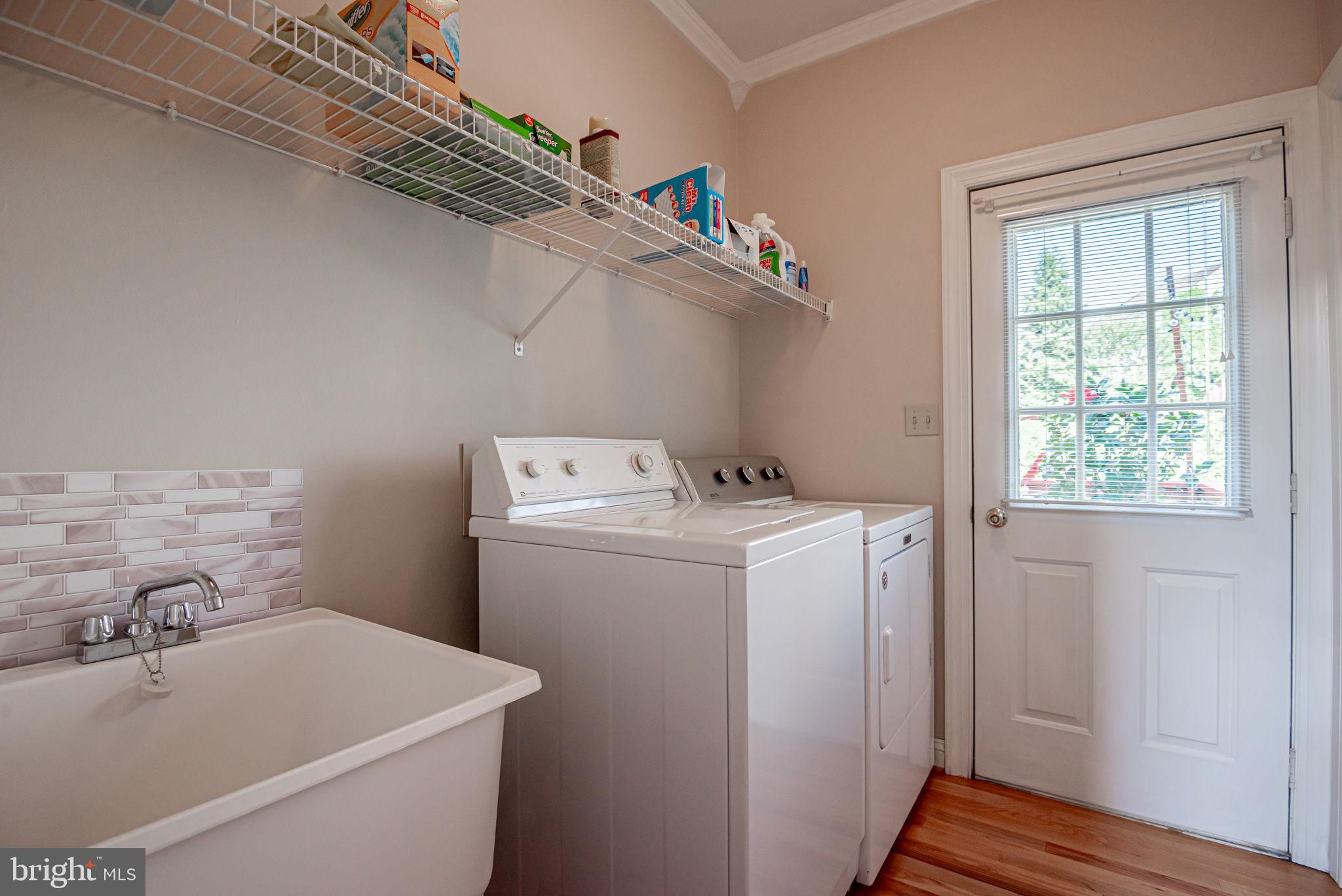 706 Regency Hill Road Hockessin, DE 19707 - Photo 27 of 54 a utility room with dryer and washer