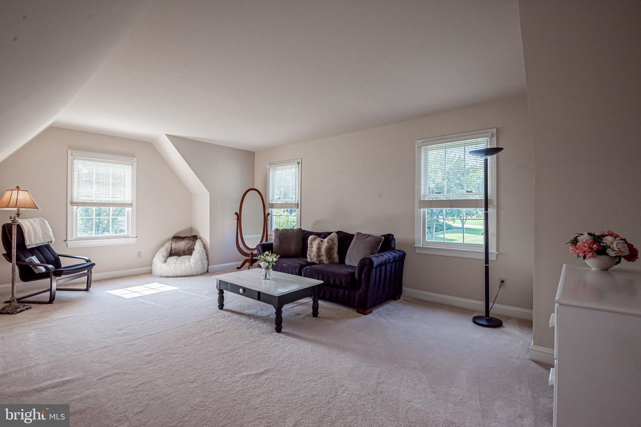 706 Regency Hill Road Hockessin, DE 19707 - Photo 31 of 54 a living room with furniture and a window