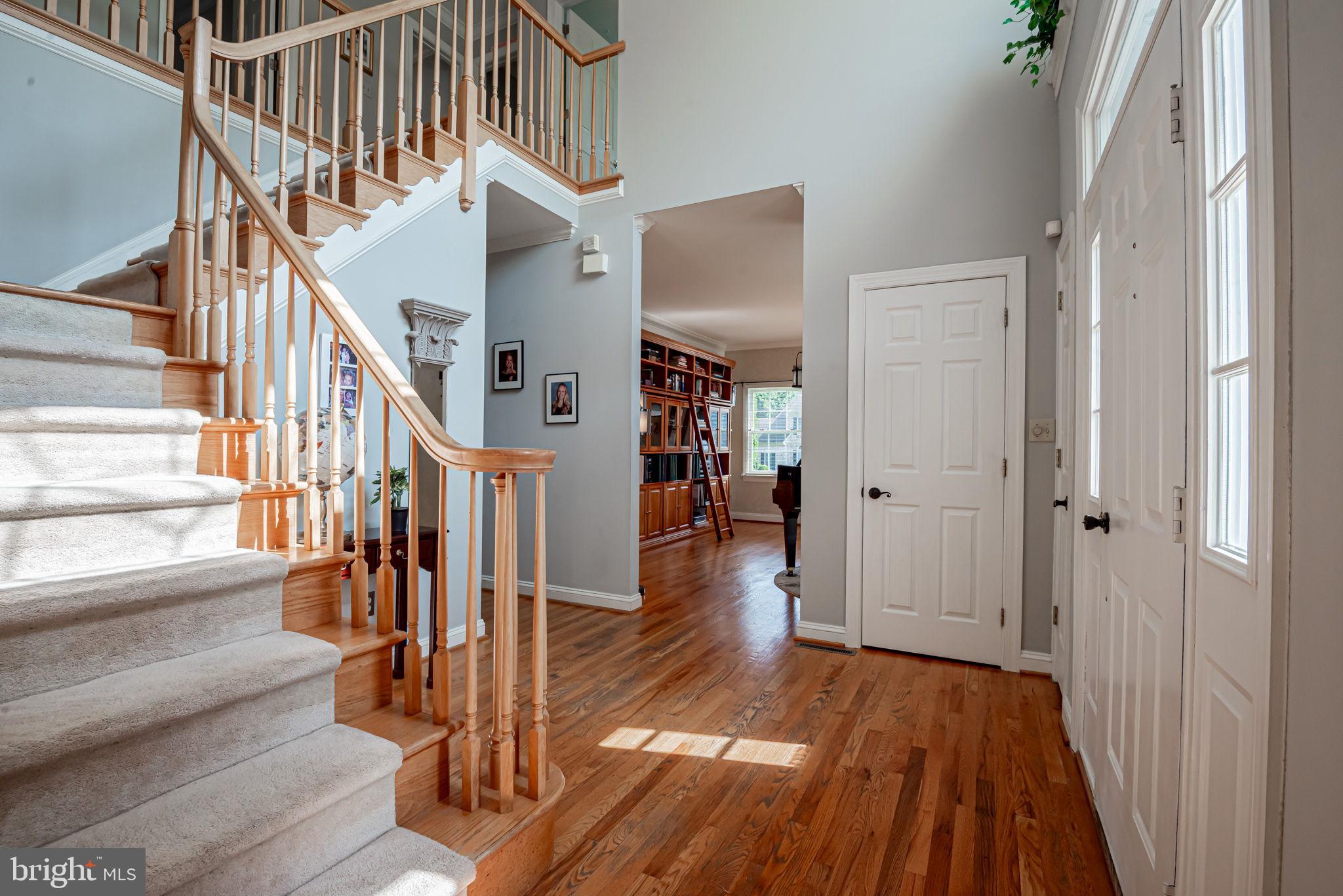 706 Regency Hill Road Hockessin, DE 19707 - Photo 4 of 54 a view of entryway and hall with wooden floor