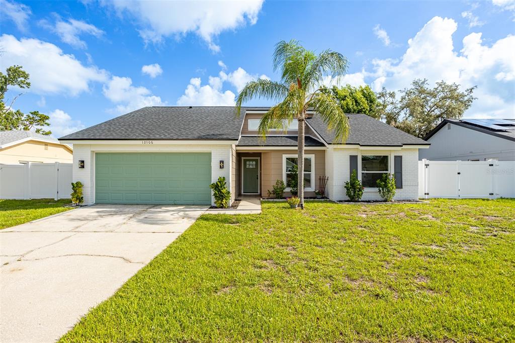 Undisclosed Address Riverview, FL 33569 - Photo 1 of 1 a front view of a house with a garden and patio
