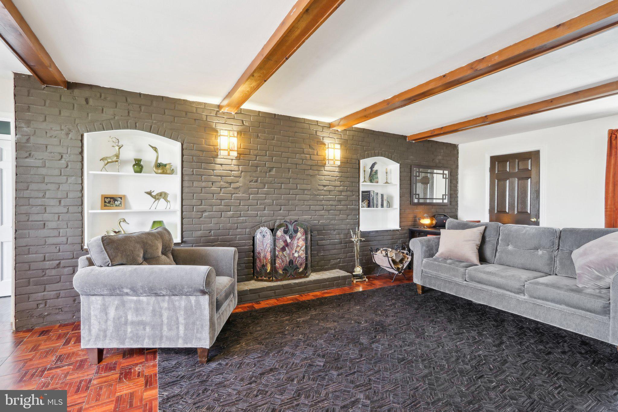 2305 Huntingdon Road Huntingdon Valley, PA 19006 - Photo 12 of 57 a living room with furniture and a couch