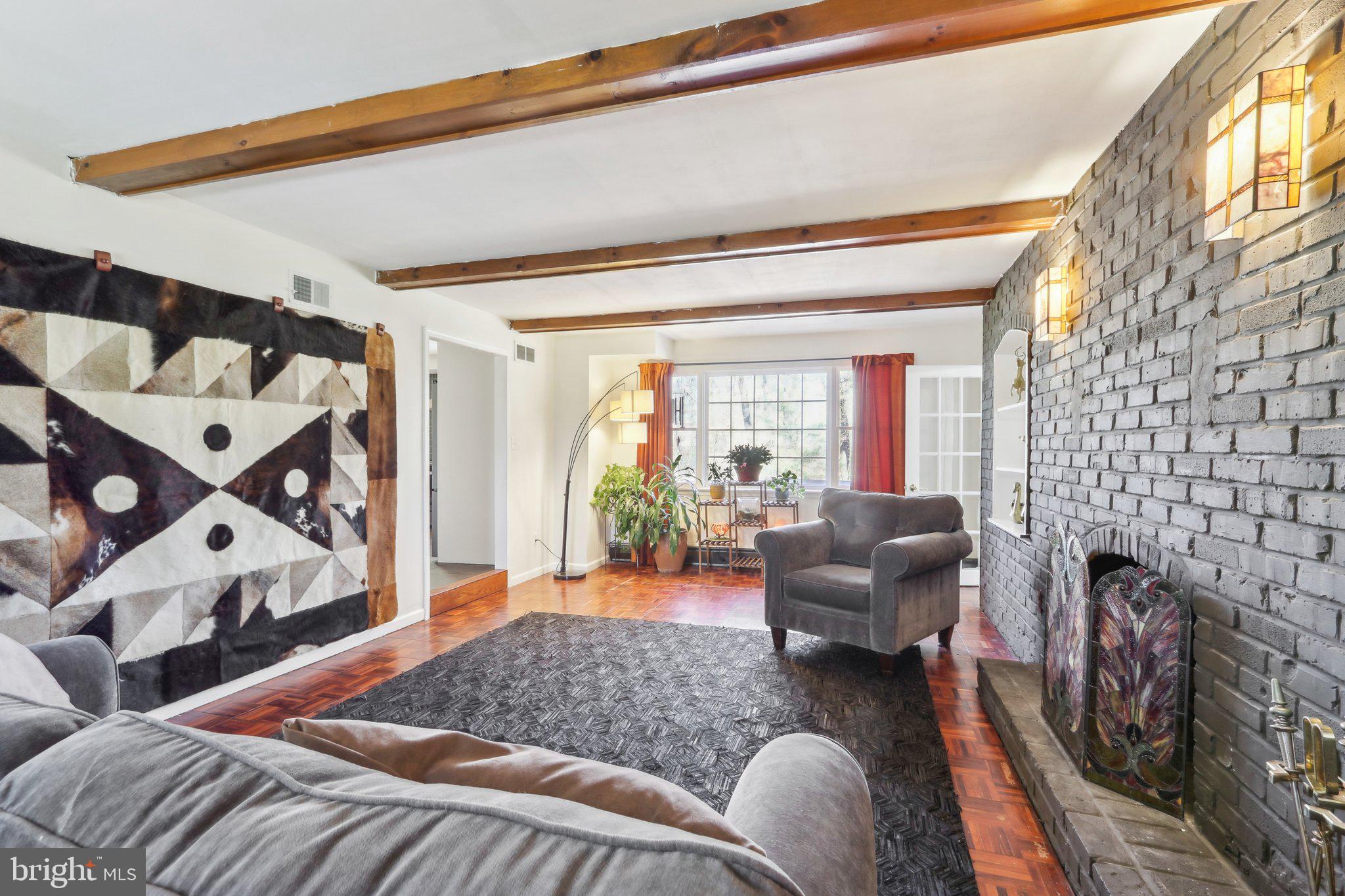 2305 Huntingdon Road Huntingdon Valley, PA 19006 - Photo 13 of 57 a living room with furniture and a floor to ceiling window