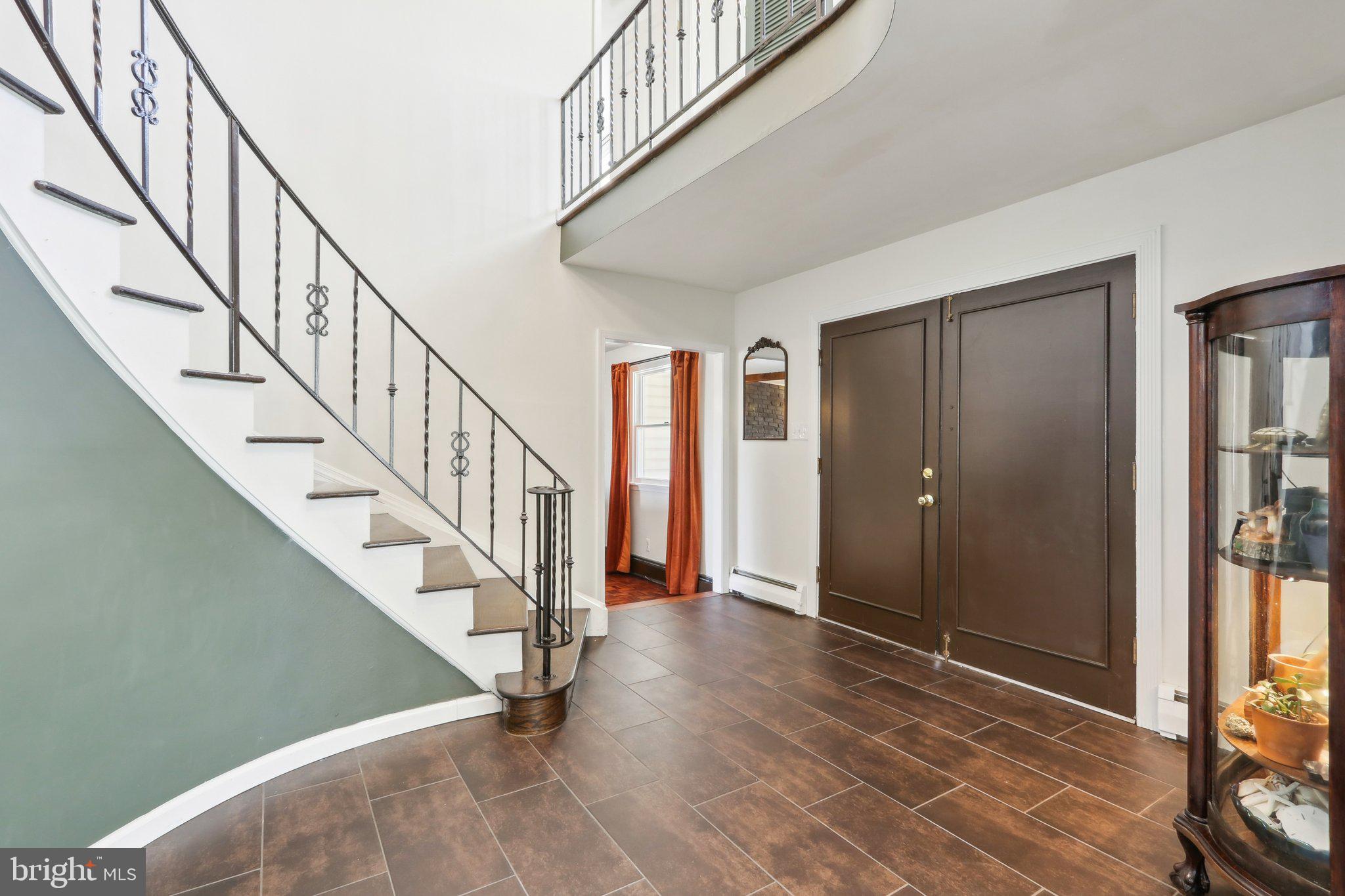 2305 Huntingdon Road Huntingdon Valley, PA 19006 - Photo 20 of 57 a view of entryway with wooden floor and stairs