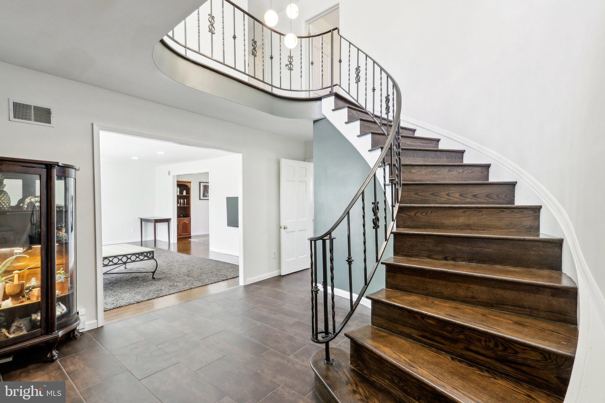 2305 Huntingdon Road Huntingdon Valley, PA 19006 - Photo 2 of 57 a view of entryway and hall with wooden floor