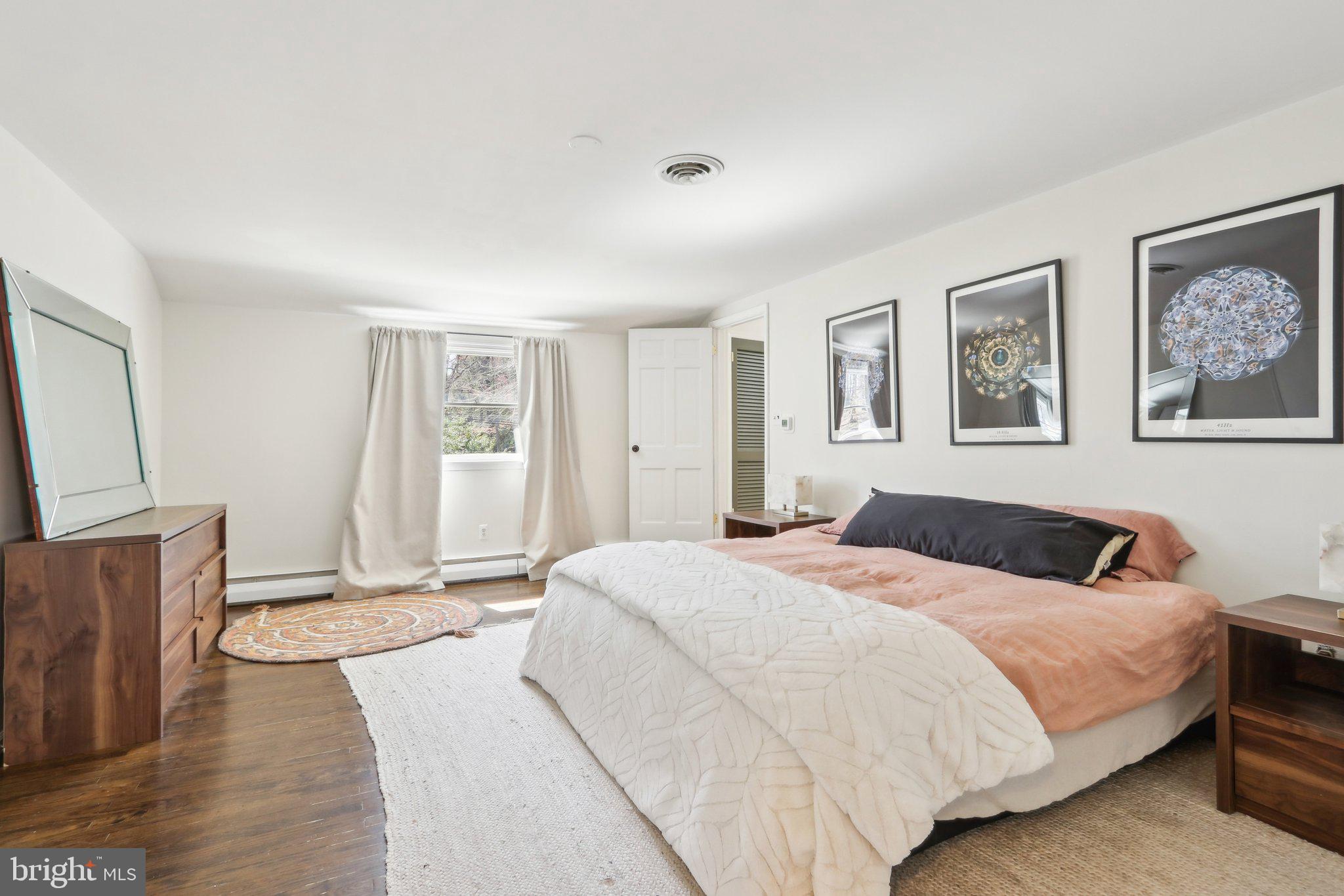 2305 Huntingdon Road Huntingdon Valley, PA 19006 - Photo 22 of 57 a bedroom with a bed and a couch