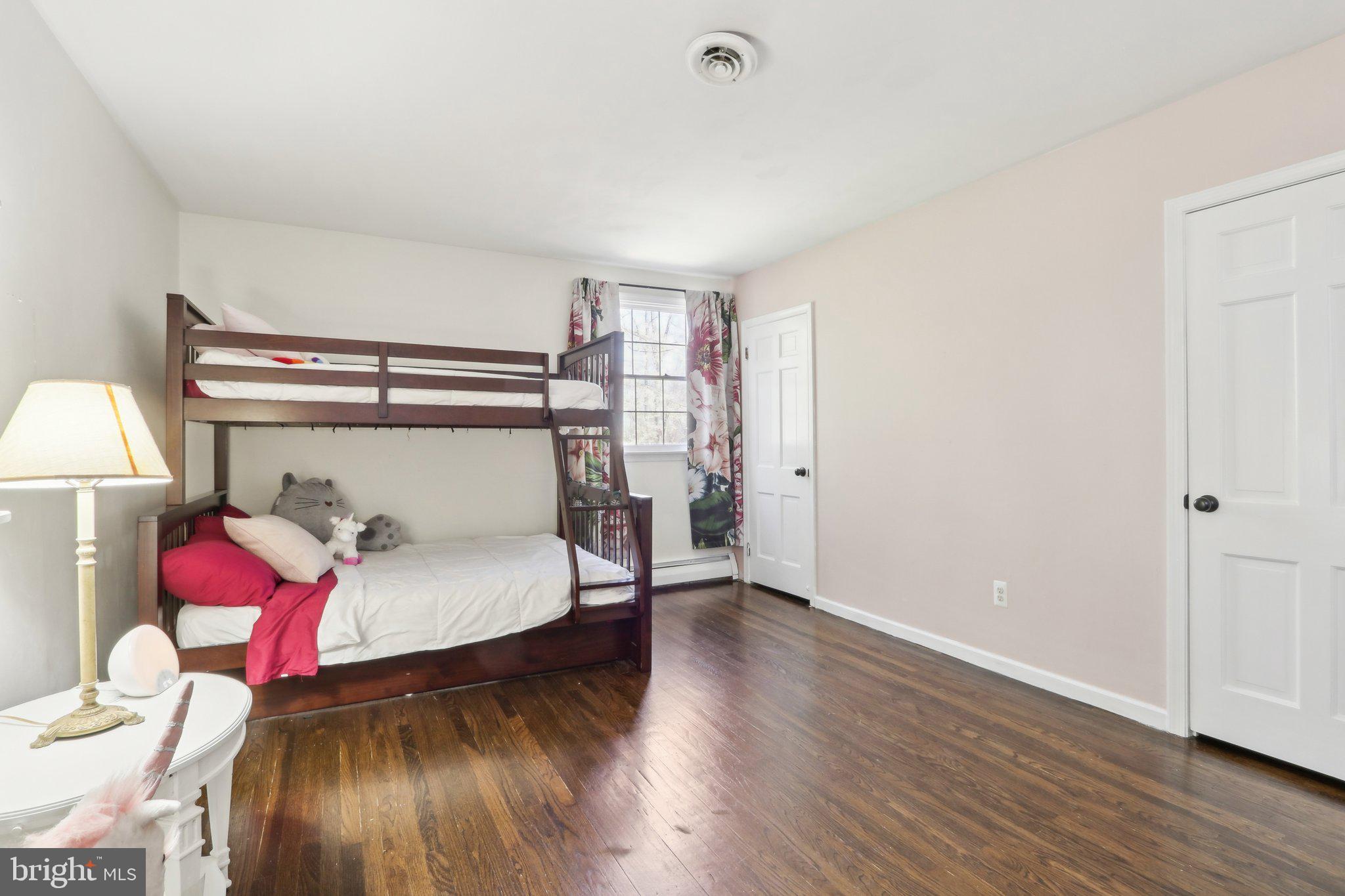 2305 Huntingdon Road Huntingdon Valley, PA 19006 - Photo 31 of 57 a bedroom with a bed and a window
