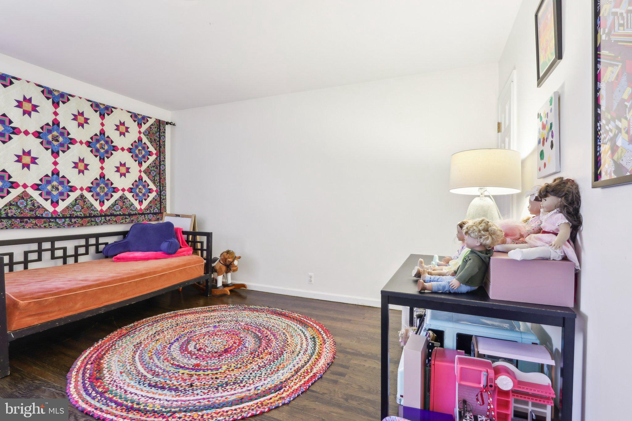 2305 Huntingdon Road Huntingdon Valley, PA 19006 - Photo 34 of 57 a bed room with a bed and a chair