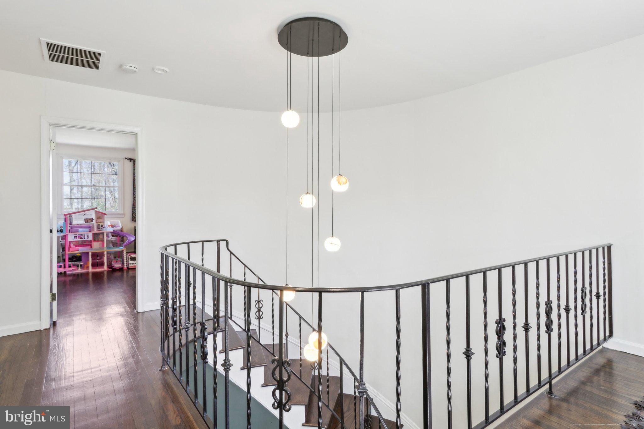 2305 Huntingdon Road Huntingdon Valley, PA 19006 - Photo 35 of 57 a view of staircase with railing and white walls