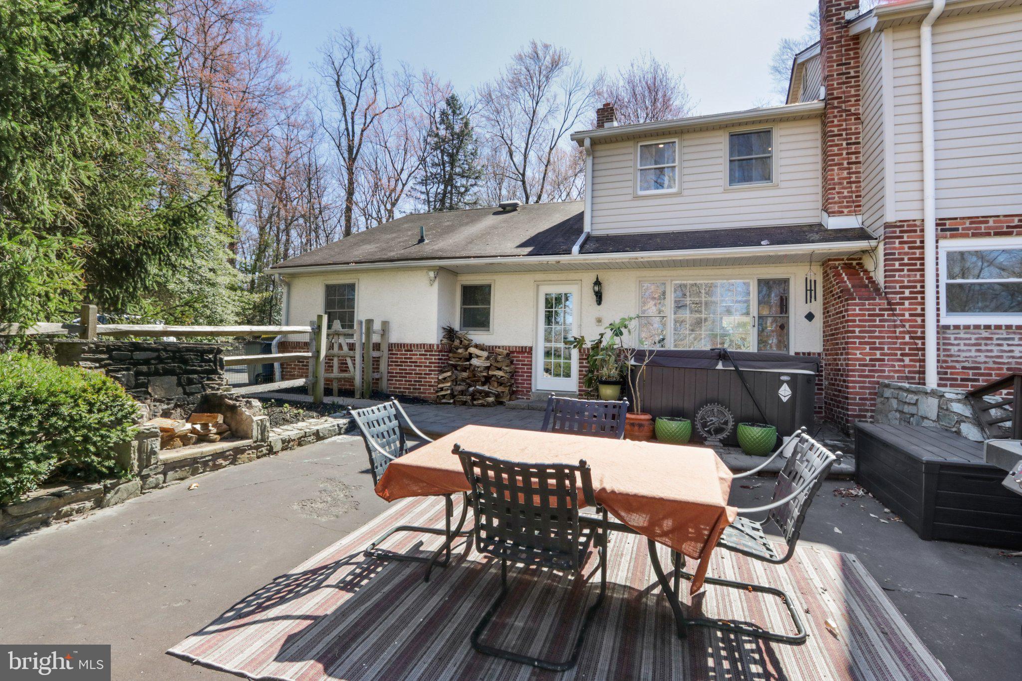 2305 Huntingdon Road Huntingdon Valley, PA 19006 - Photo 47 of 57 a view of a patio with table and chairs and potted plants