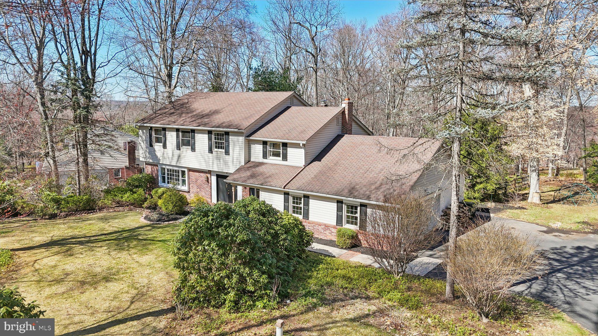 2305 Huntingdon Road Huntingdon Valley, PA 19006 - Photo 53 of 57 front view of a house with a yard