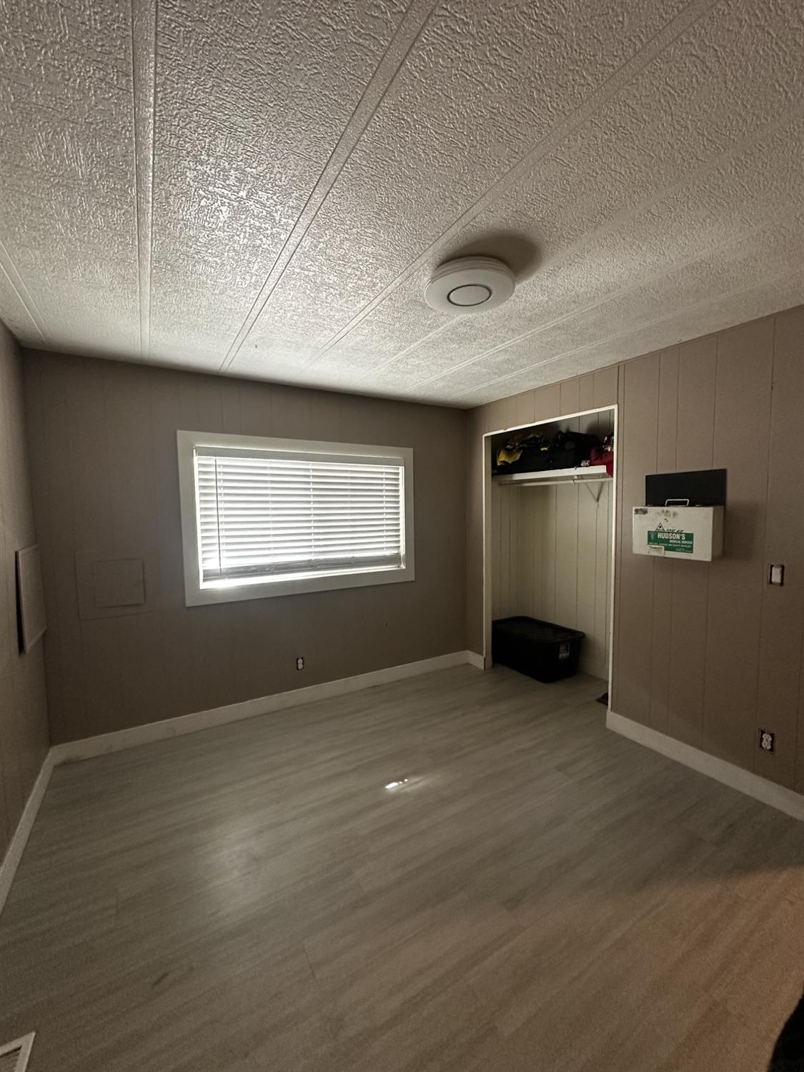 15820 South Harlan Road, Unit 16 Lathrop, CA 95330 - Photo 13 of 16 a view of an empty room with a window