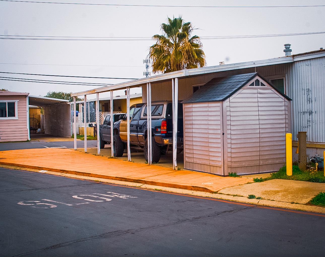 15820 South Harlan Road, Unit 16 Lathrop, CA 95330 - Photo 15 of 16 a view of a house with a patio