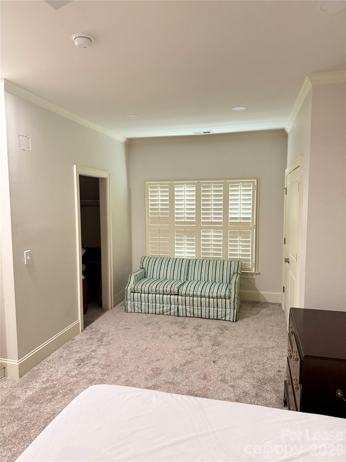 421 Spring Street Davidson, NC 28036 - Photo 12 of 24 a living room with a bed and a window