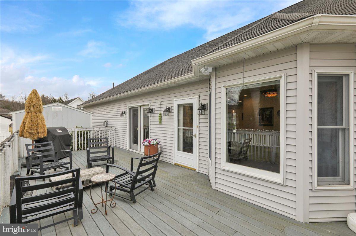 3075 Village Road Orwigsburg, PA 17961 - Photo 30 of 34 Charming deck for outdoor relaxation.