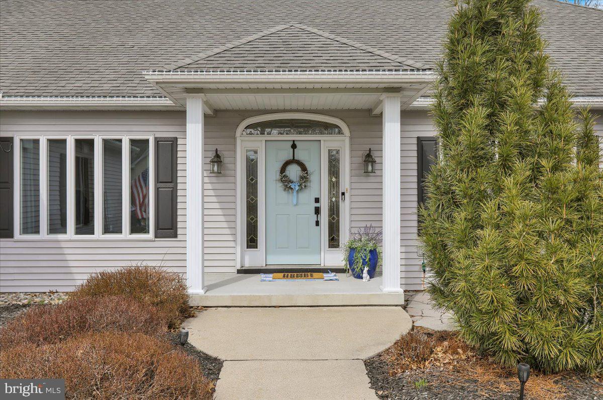 3075 Village Road Orwigsburg, PA 17961 - Photo 34 of 34 Charming entrance with seasonal flair.