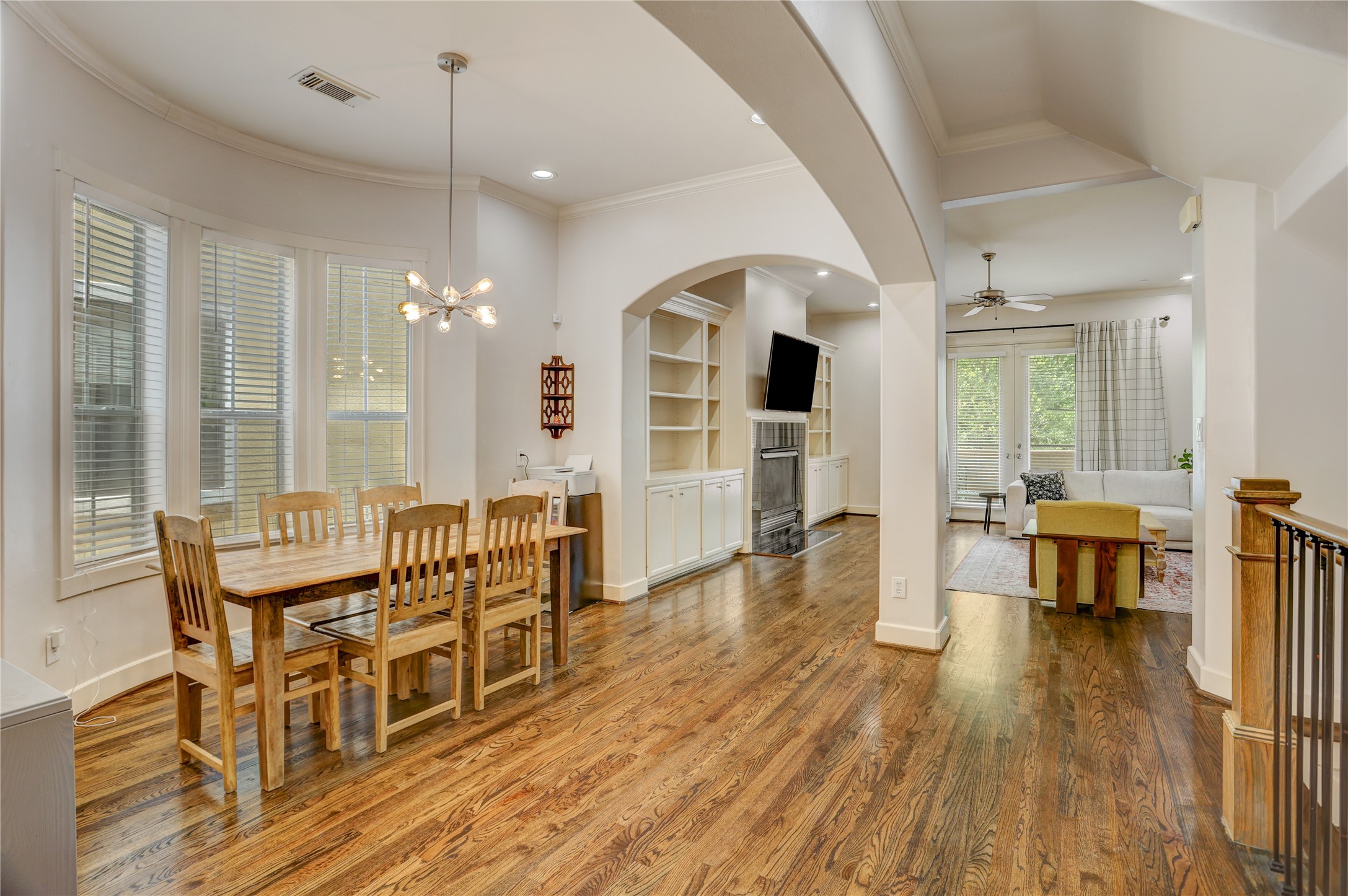 4262 Childress Street, Unit B Houston, TX 77005 - Photo 7 of 22 a view of a dining room with furniture window and wooden floor