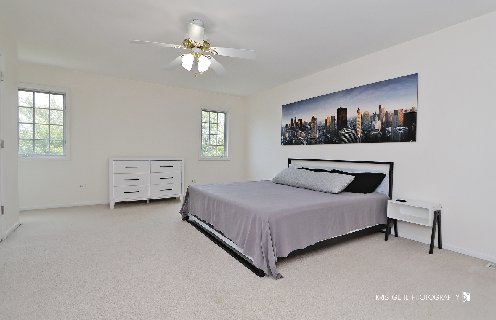 1277 Queen Ann Lane Gurnee, IL 60031 - Photo 14 of 25 a bedroom with a bed and a painting on the wall