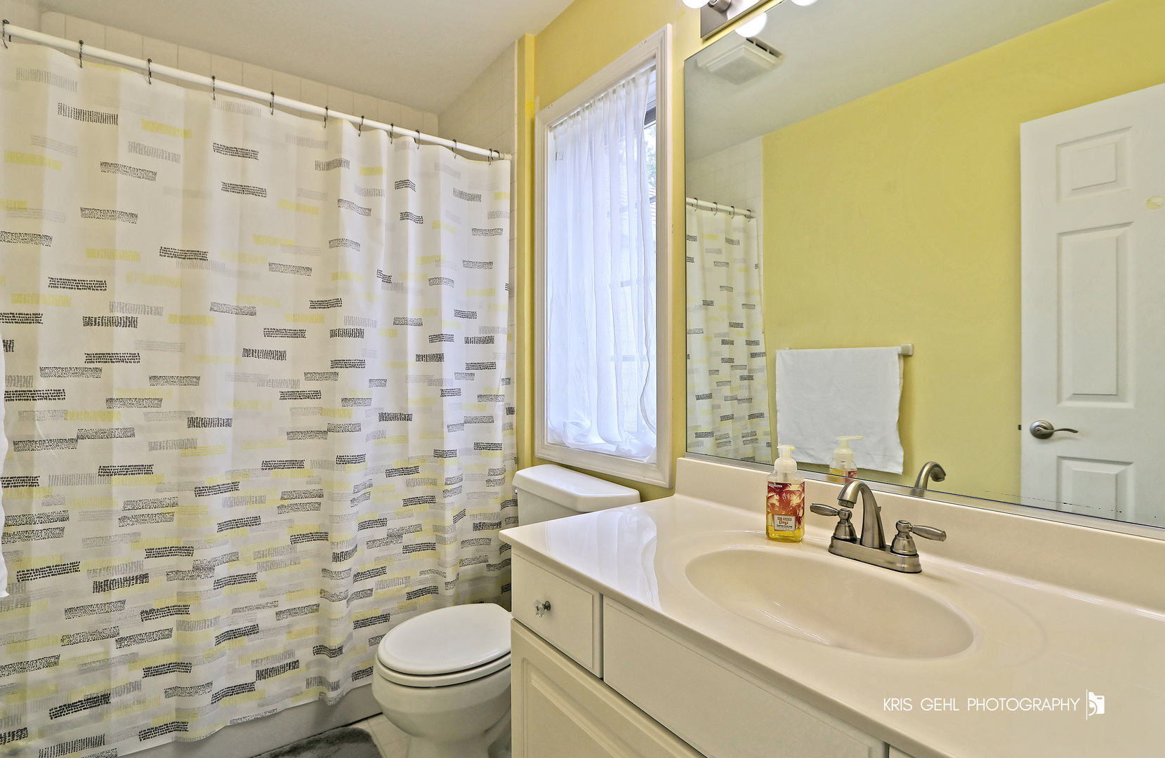 1277 Queen Ann Lane Gurnee, IL 60031 - Photo 18 of 25 a bathroom with a sink and a mirror